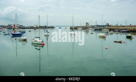 Yachts and boats docked in Howth`s Harbor, Dublin, Ireland Stock Photo